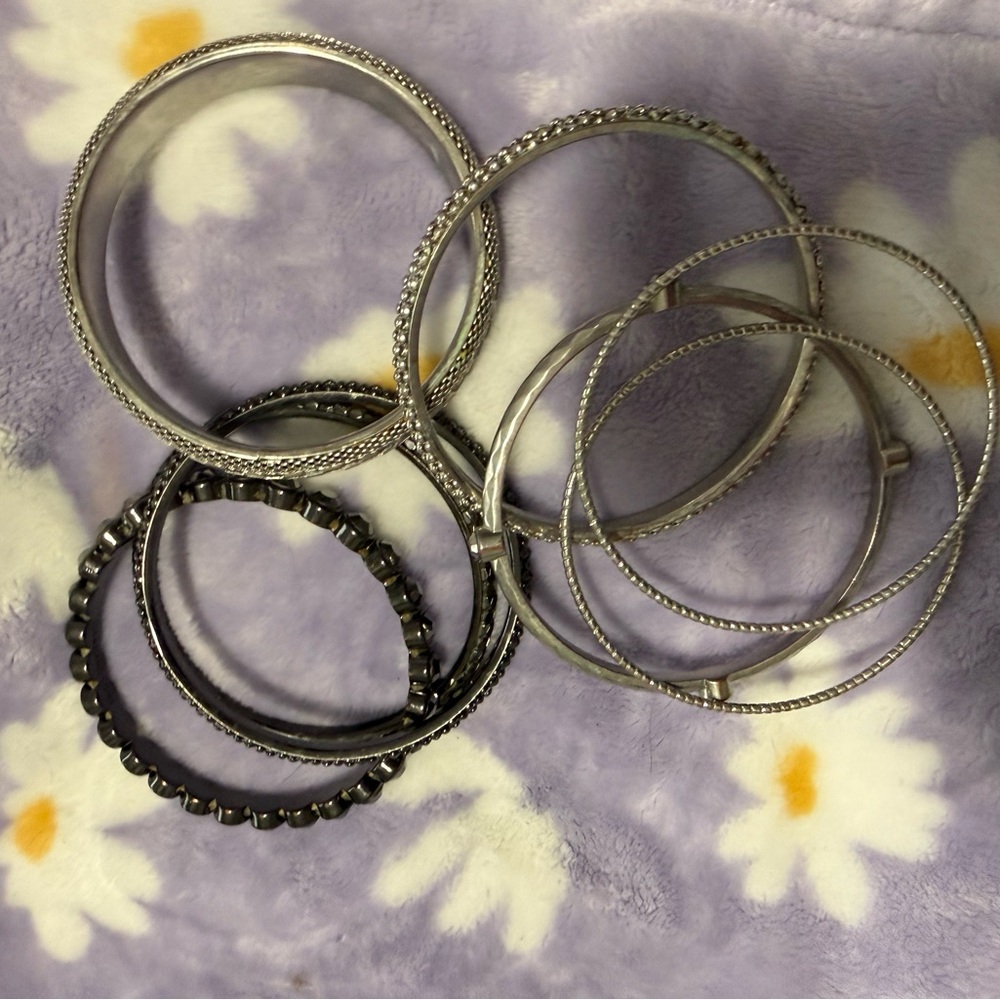Stylish Silver and Black Bangle Set
You get all for one low price - Picture 9 of 12